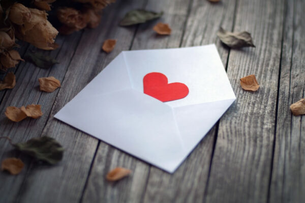 open-envelope-with-single-red-paper-heart-framed-b-2023-04-03-20-46-38-utc